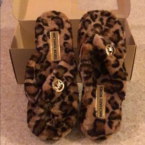 Brand new in box Michael Kors Slippers!  Size 10